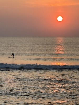Sunrise and the Paddle Boarder